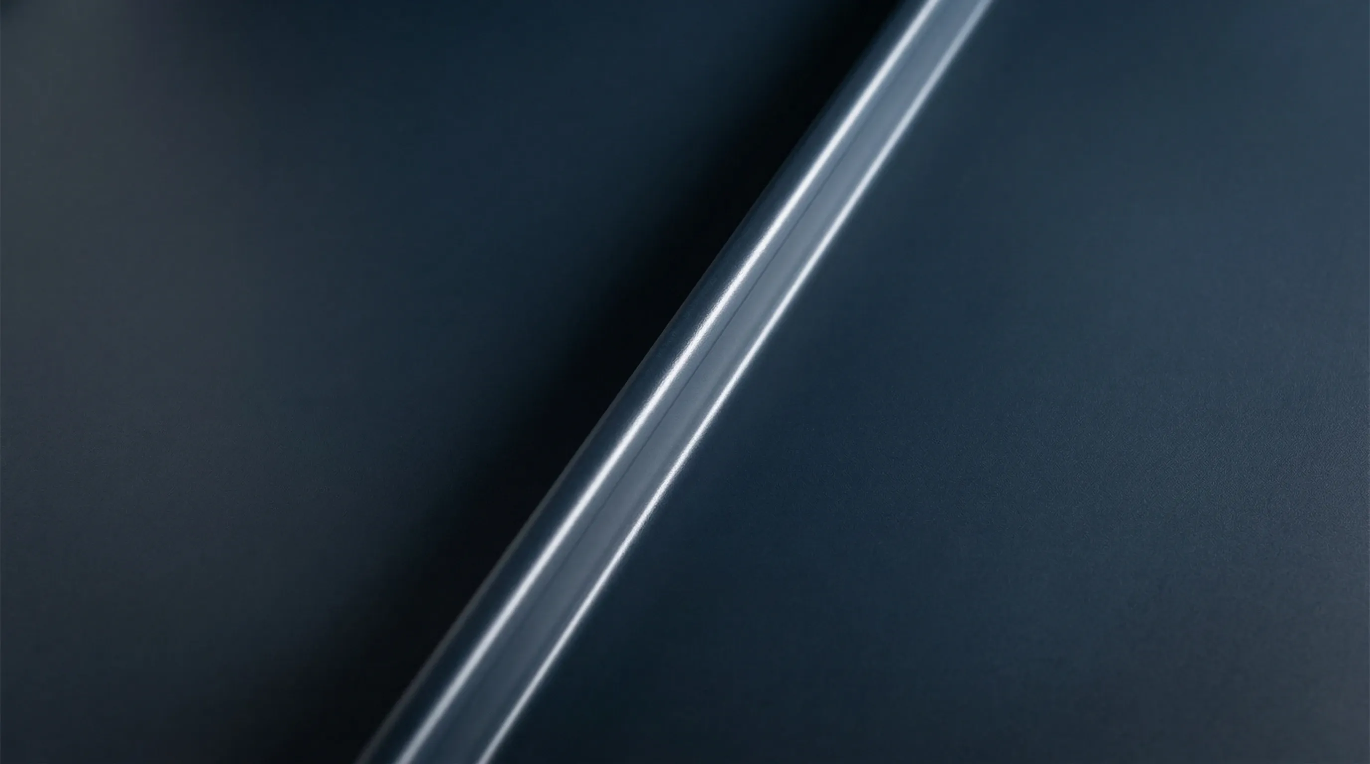 Extreme close-up of standing seam metal roofing showing precision lock geometry