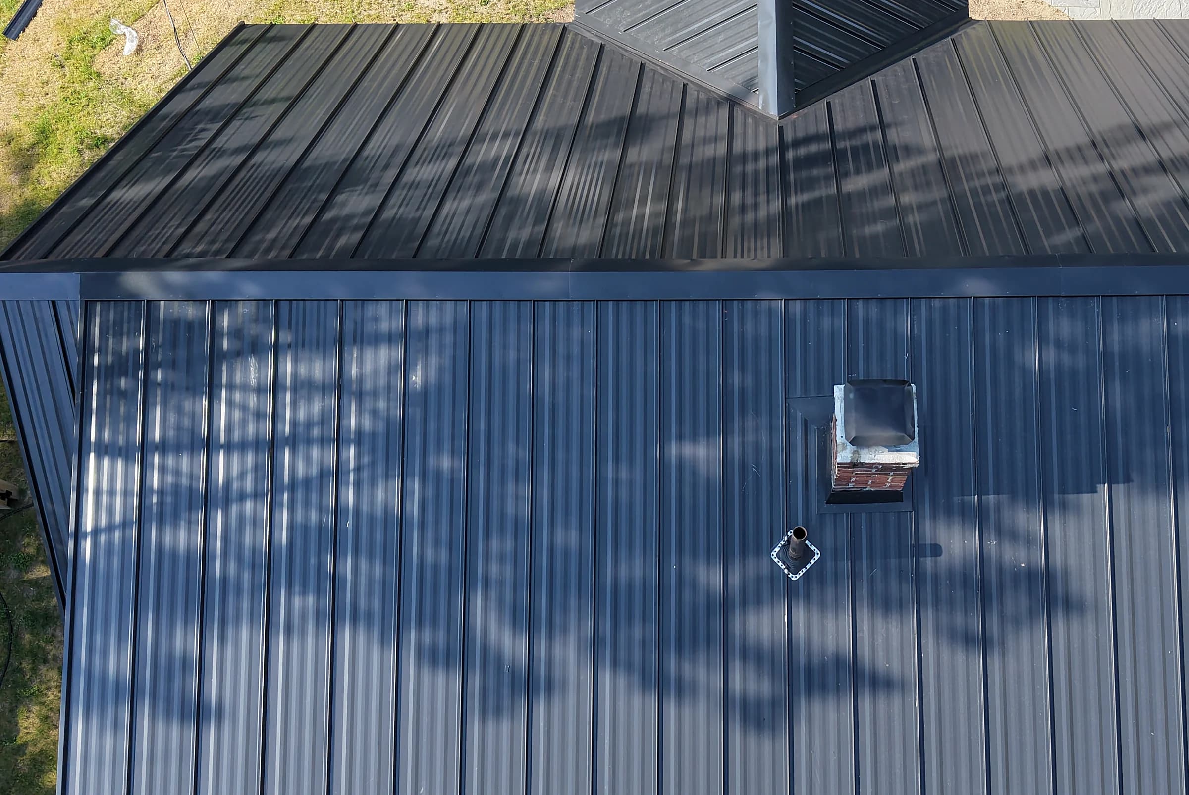 Standing seam panel and seam detail on a home in Brunswick, Maine by GraniteShield Roofing & Exteriors
